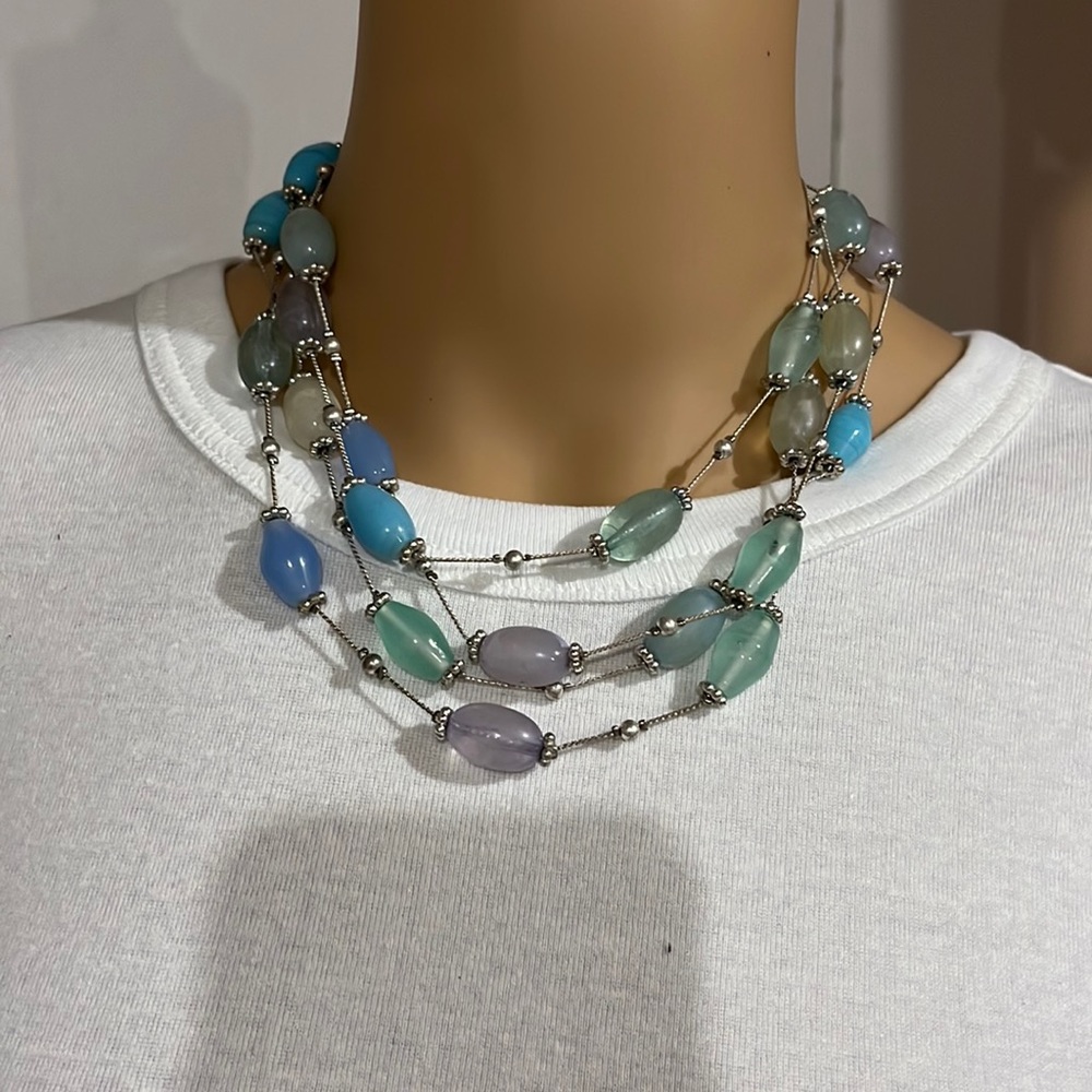 Four strand blue and green beaded necklace